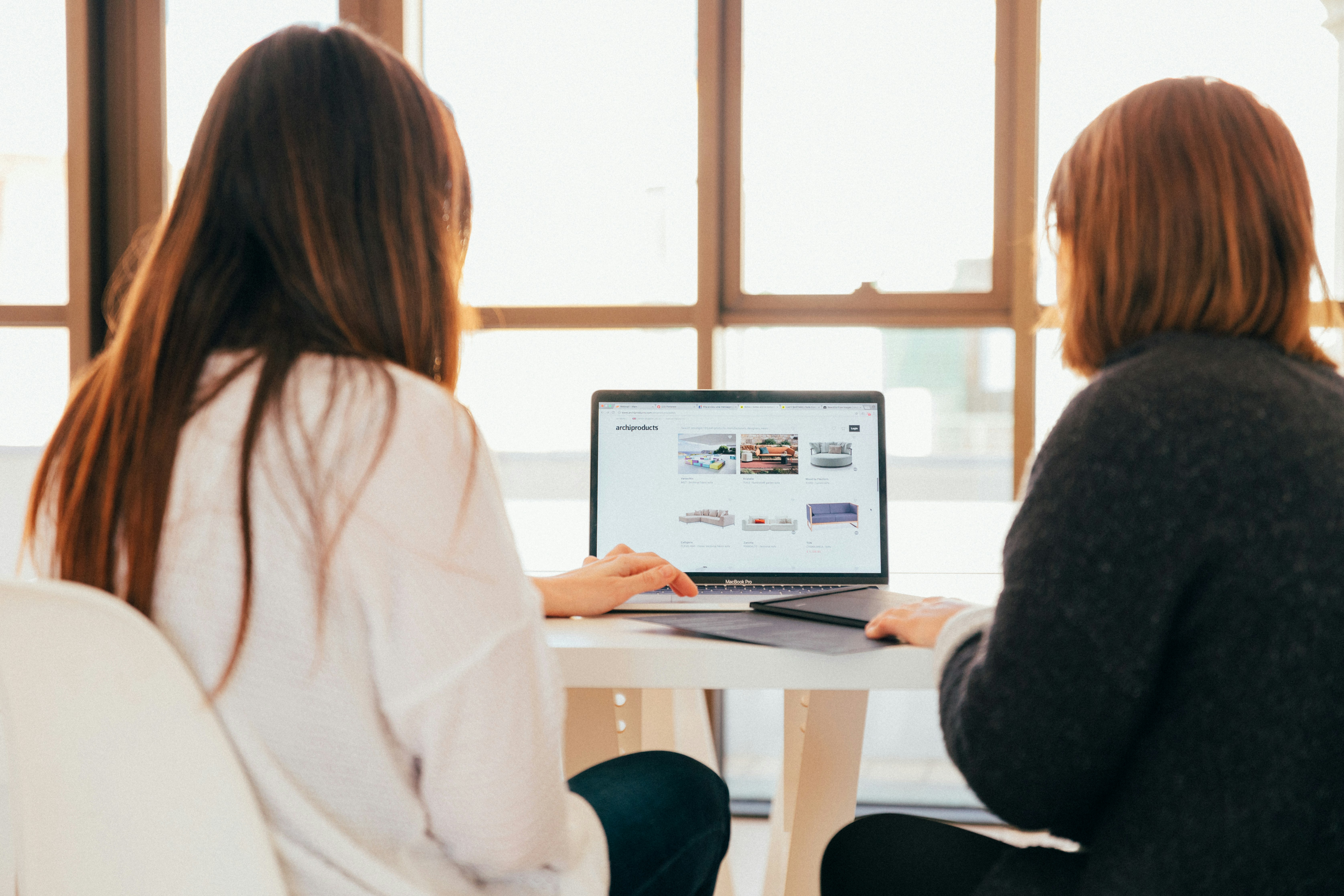 Women Using Laptop - Omnichannel eCommerce