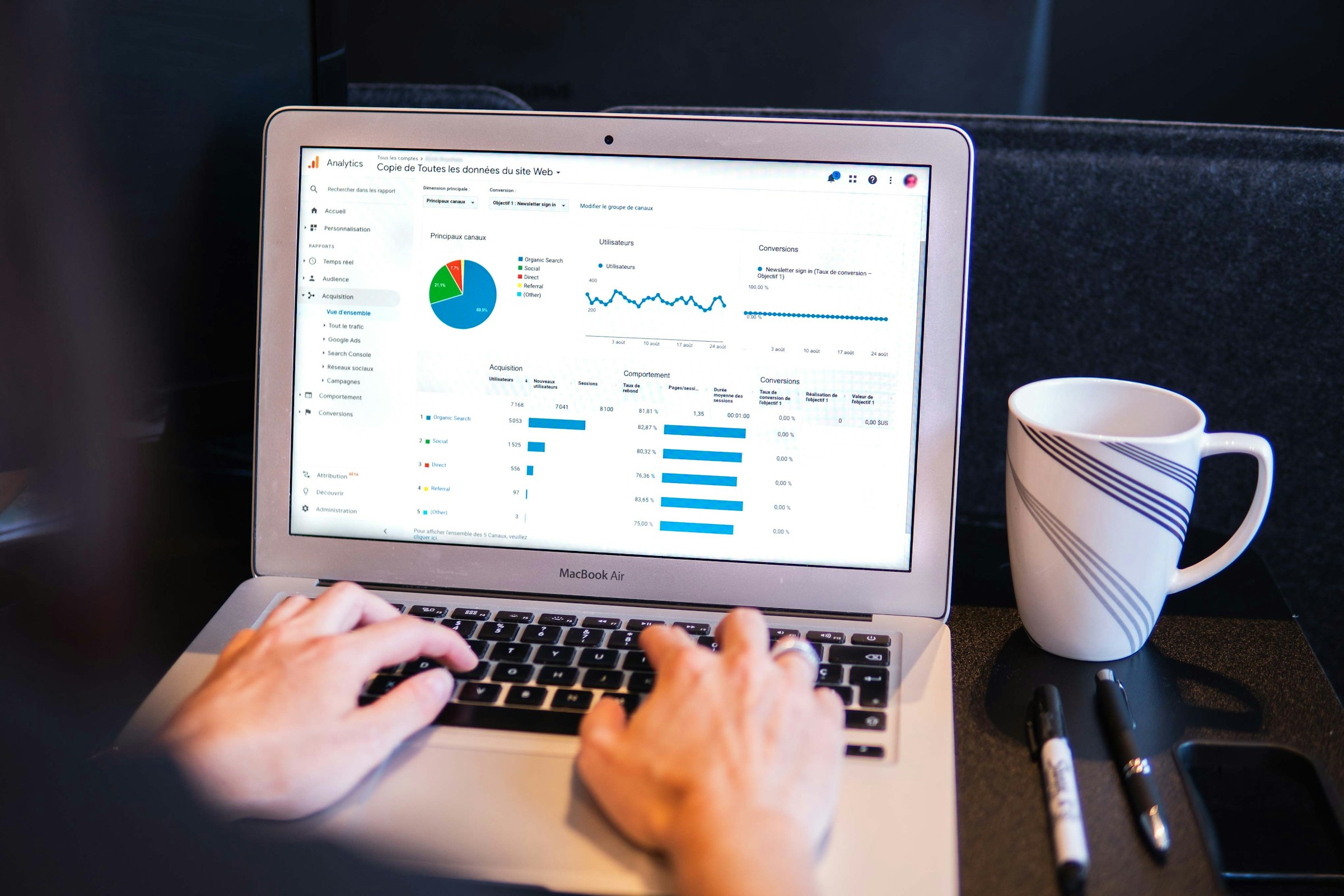 Person Analyzing CRM Analytics - Hubspot vs Marketo